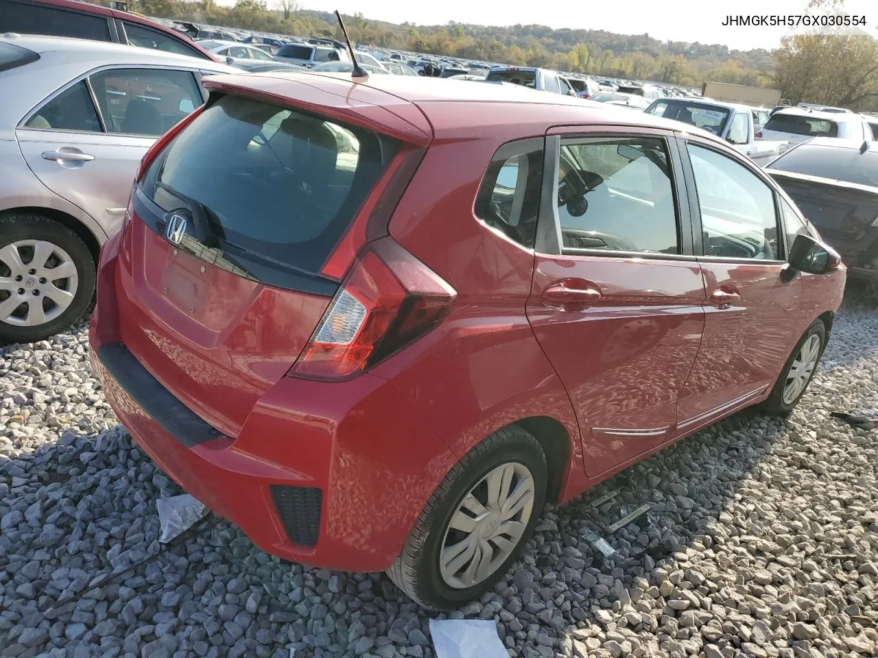 2016 Honda Fit Lx VIN: JHMGK5H57GX030554 Lot: 77676884