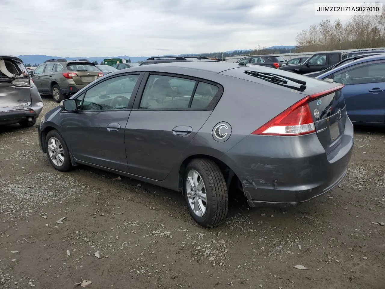 2010 Honda Insight Ex VIN: JHMZE2H71AS027010 Lot: 77662404