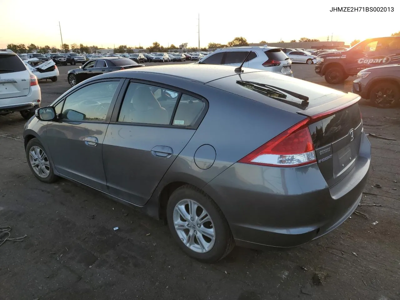 2011 Honda Insight Ex VIN: JHMZE2H71BS002013 Lot: 69031314