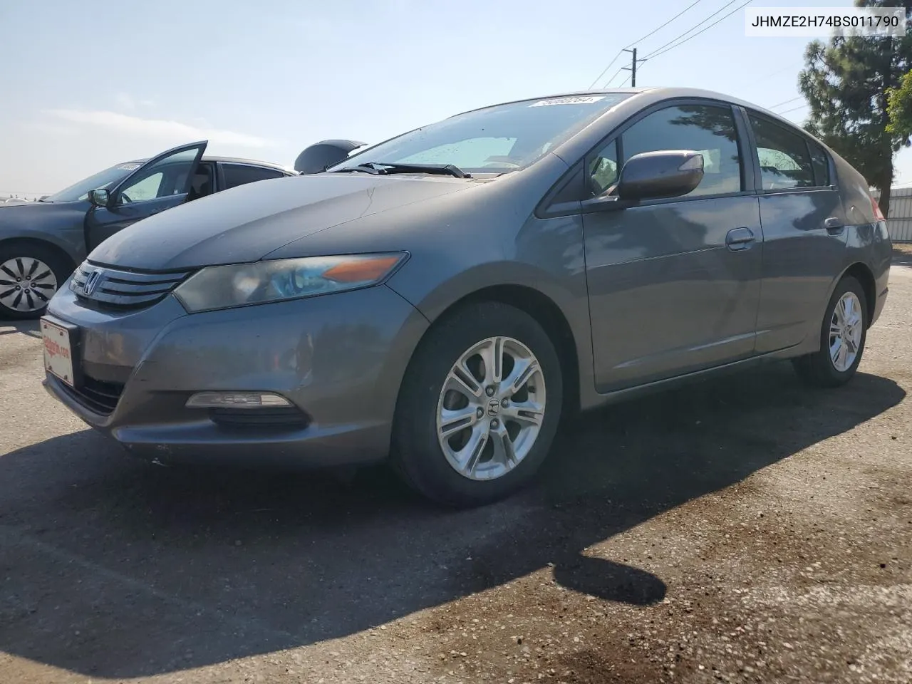 2011 Honda Insight Ex VIN: JHMZE2H74BS011790 Lot: 75060284