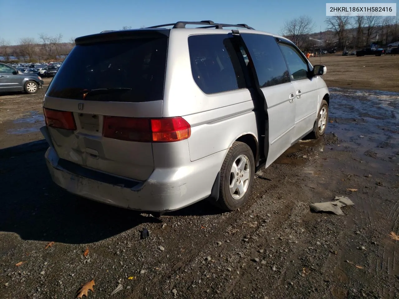 2001 Honda Odyssey Ex VIN: 2HKRL186X1H582416 Lot: 66563941