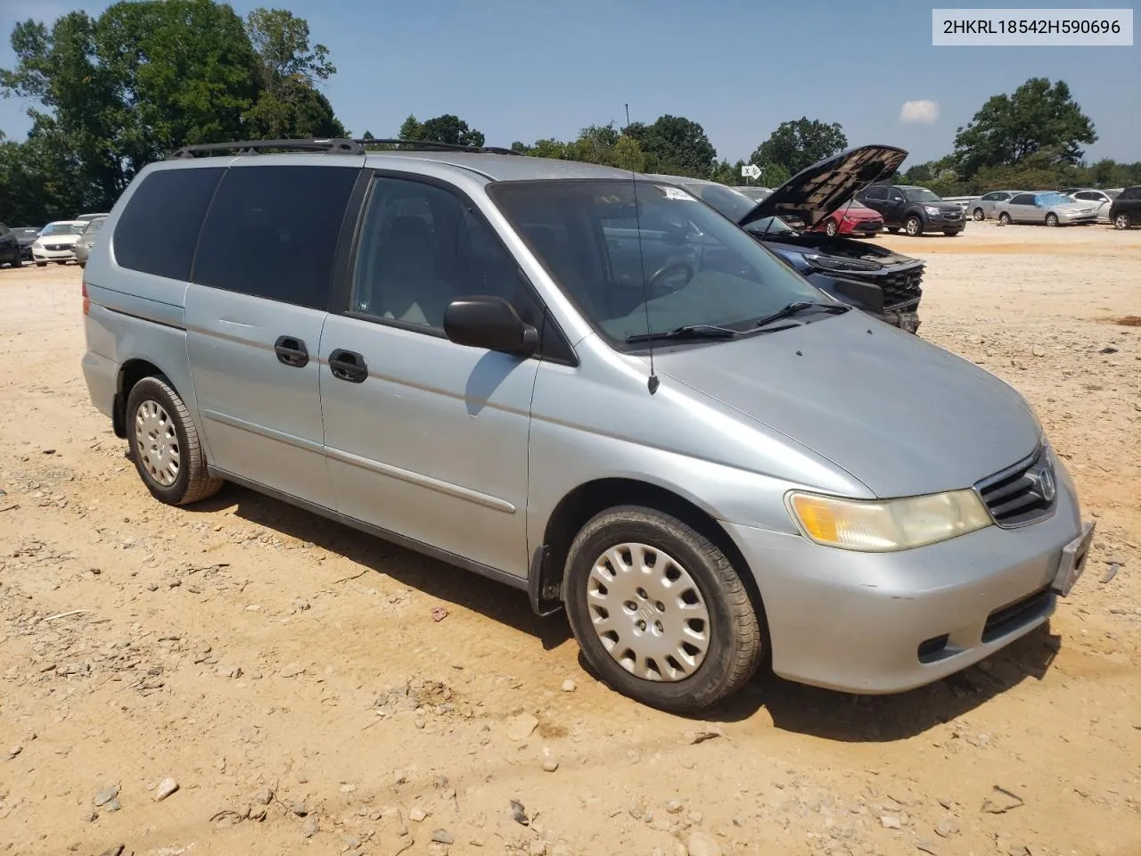 2002 Honda Odyssey Lx VIN: 2HKRL18542H590696 Lot: 69449514