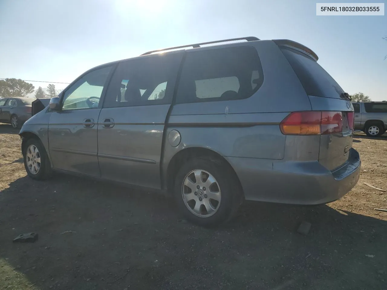 2002 Honda Odyssey Exl VIN: 5FNRL18032B033555 Lot: 70860344