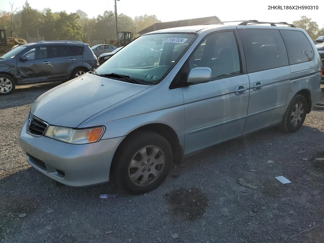 2002 Honda Odyssey Ex VIN: 2HKRL186X2H590310 Lot: 71567524