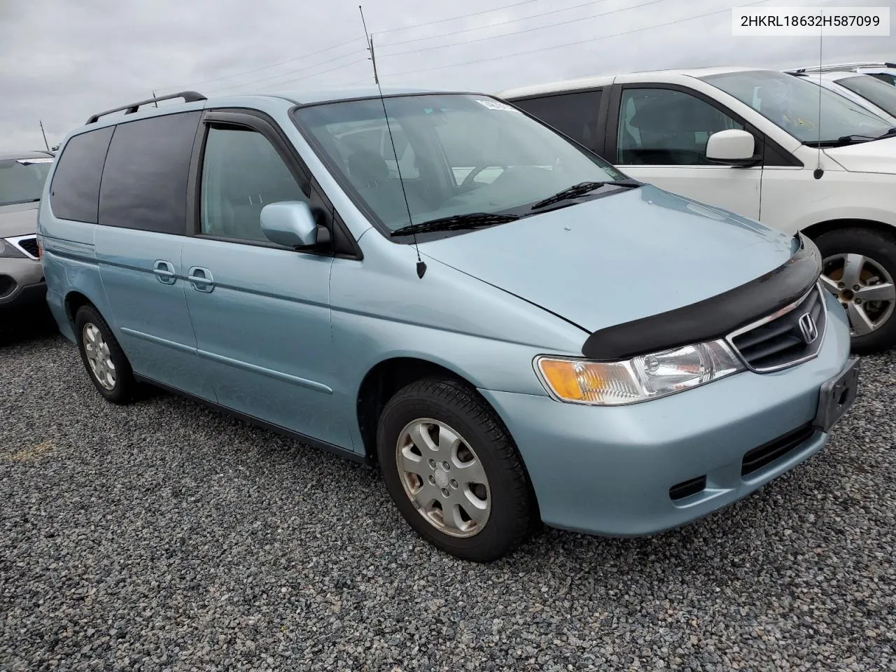 2002 Honda Odyssey Ex VIN: 2HKRL18632H587099 Lot: 74678114