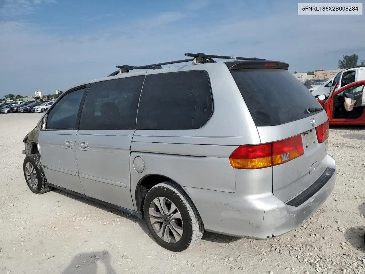 2002 Honda Odyssey Ex VIN: 5FNRL186X2B008284 Lot: 76110314