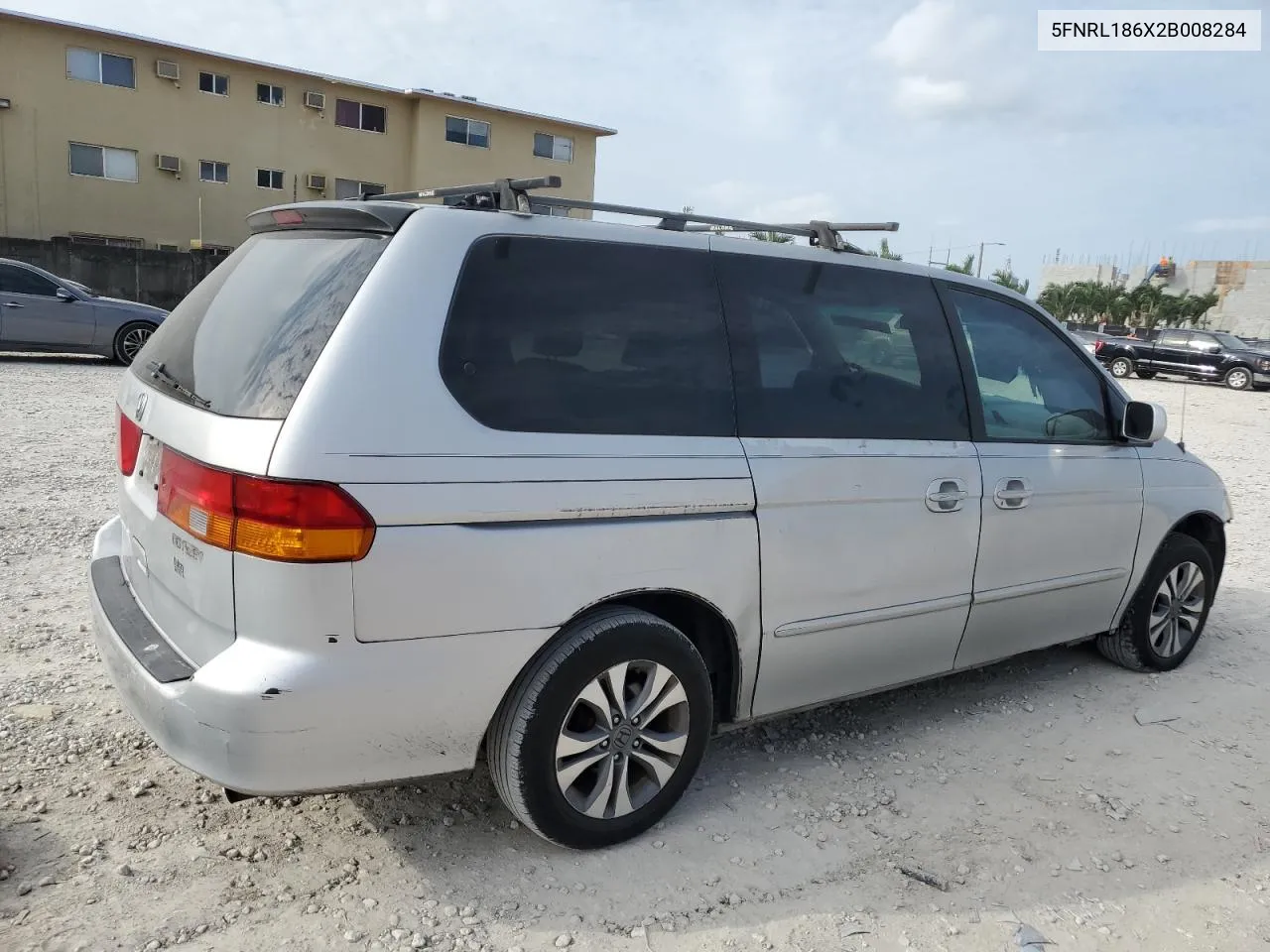 2002 Honda Odyssey Ex VIN: 5FNRL186X2B008284 Lot: 76110314