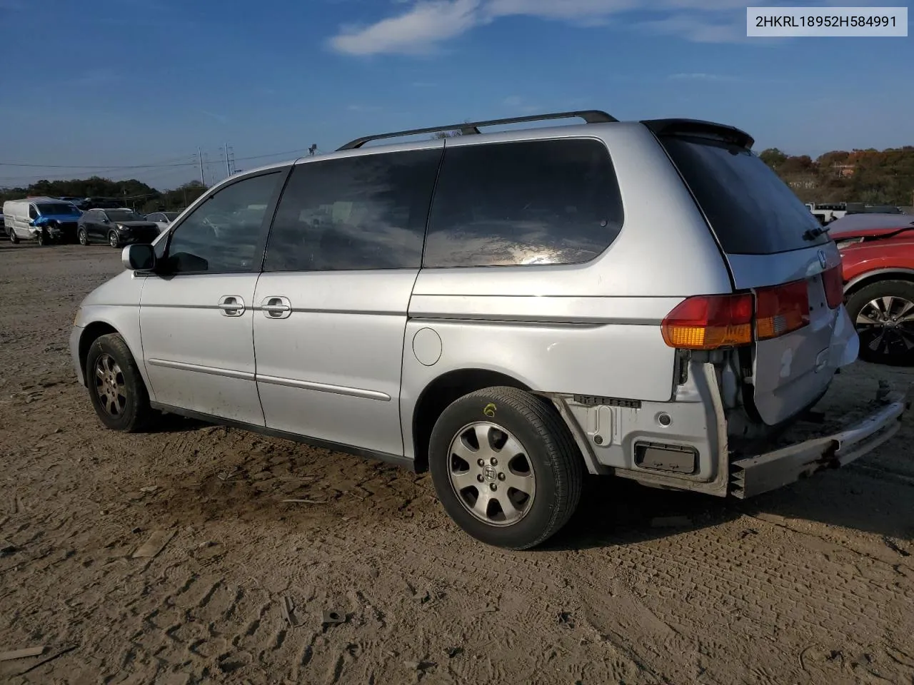 2002 Honda Odyssey Exl VIN: 2HKRL18952H584991 Lot: 77950624