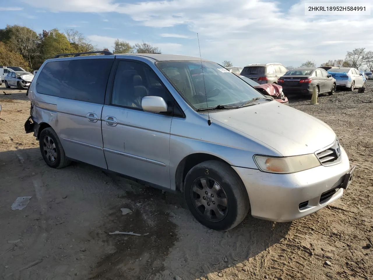 2002 Honda Odyssey Exl VIN: 2HKRL18952H584991 Lot: 77950624