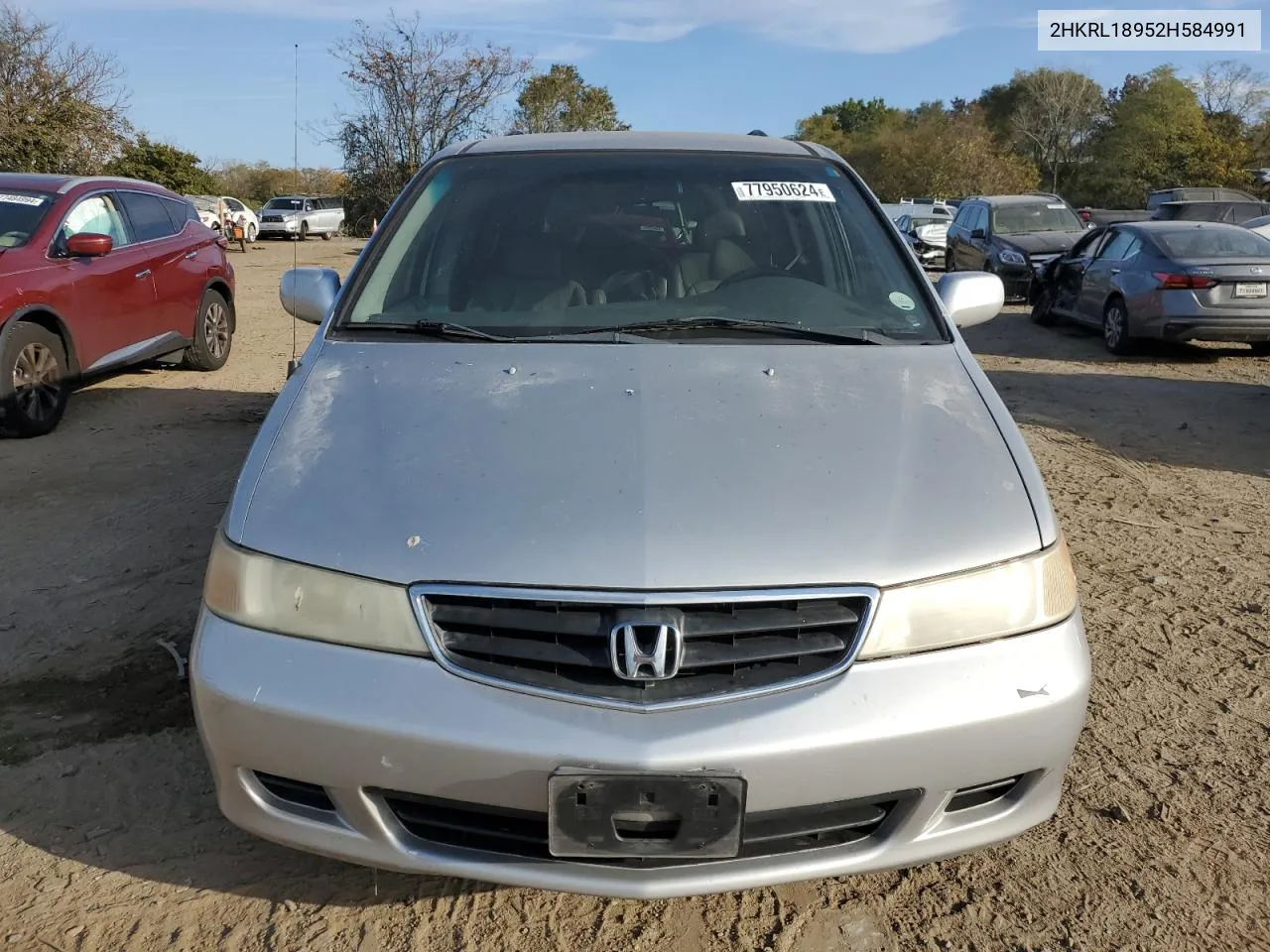 2002 Honda Odyssey Exl VIN: 2HKRL18952H584991 Lot: 77950624