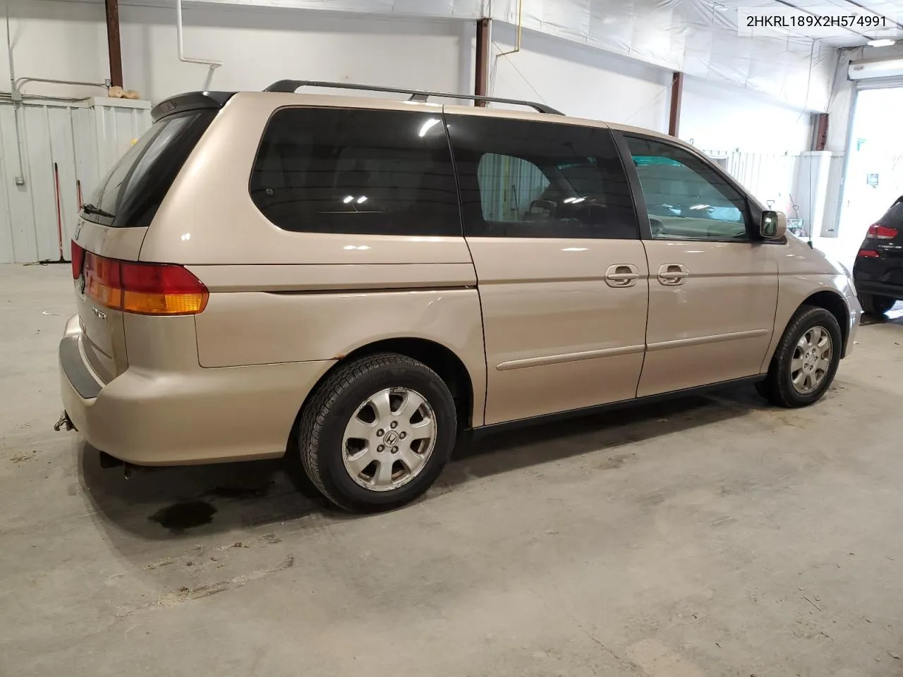 2002 Honda Odyssey Exl VIN: 2HKRL189X2H574991 Lot: 80423984