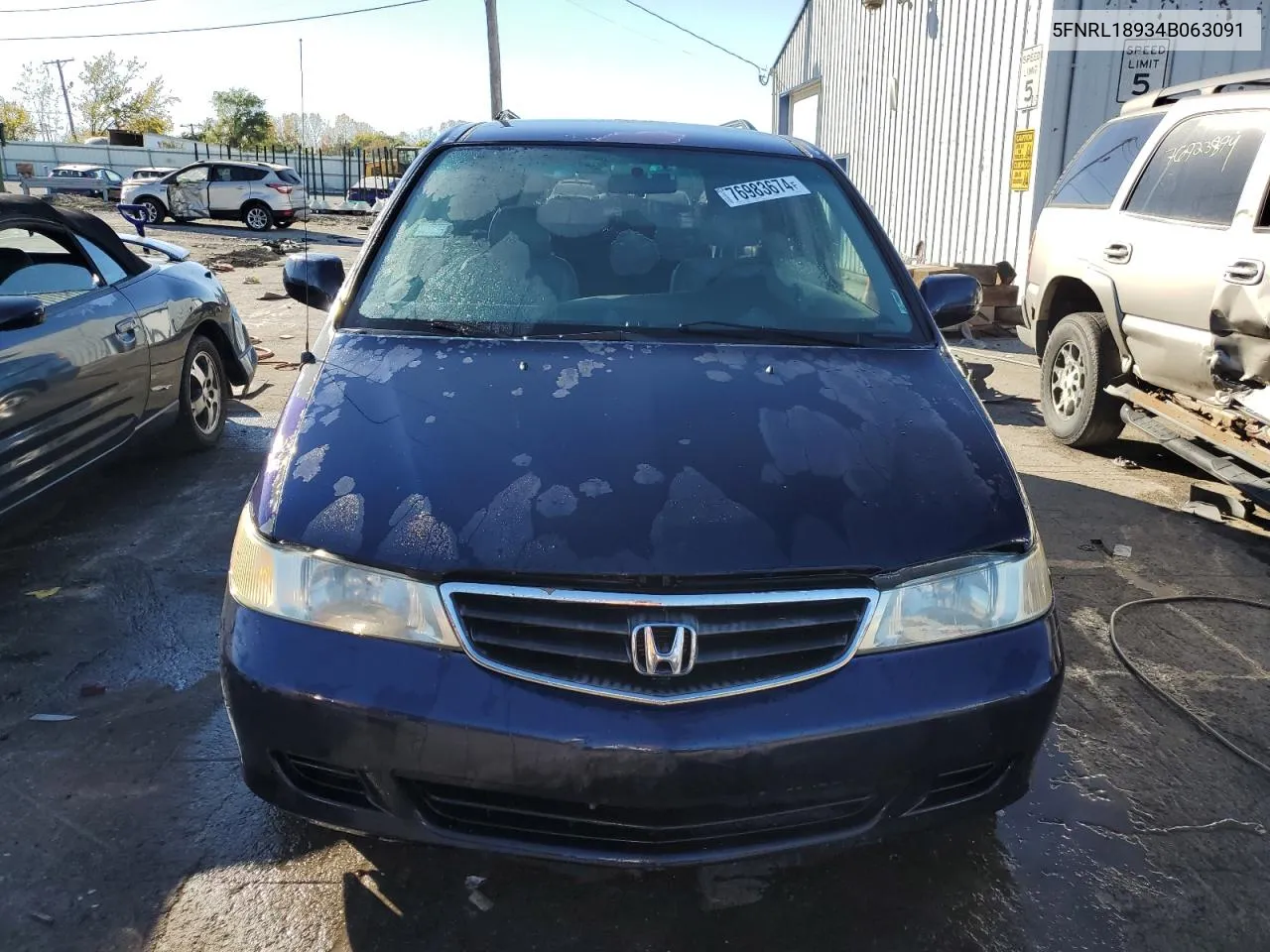 2004 Honda Odyssey Exl VIN: 5FNRL18934B063091 Lot: 76983674