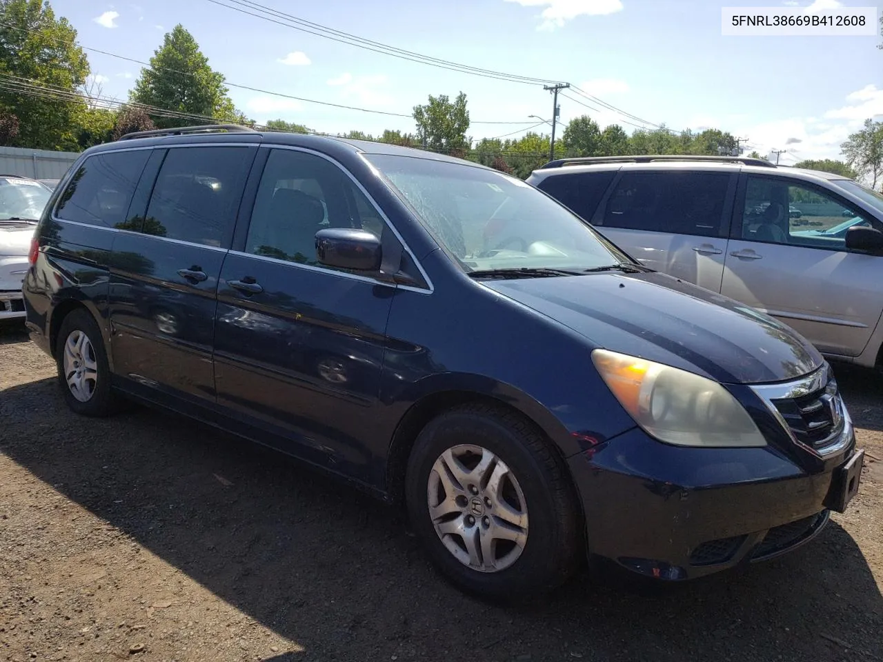 2009 Honda Odyssey Exl VIN: 5FNRL38669B412608 Lot: 66578364