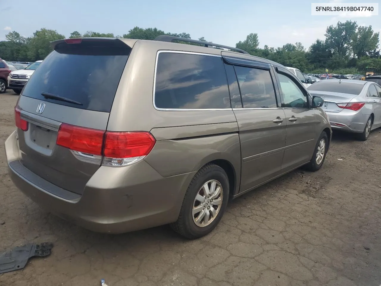 2009 Honda Odyssey Ex VIN: 5FNRL38419B047740 Lot: 66684174