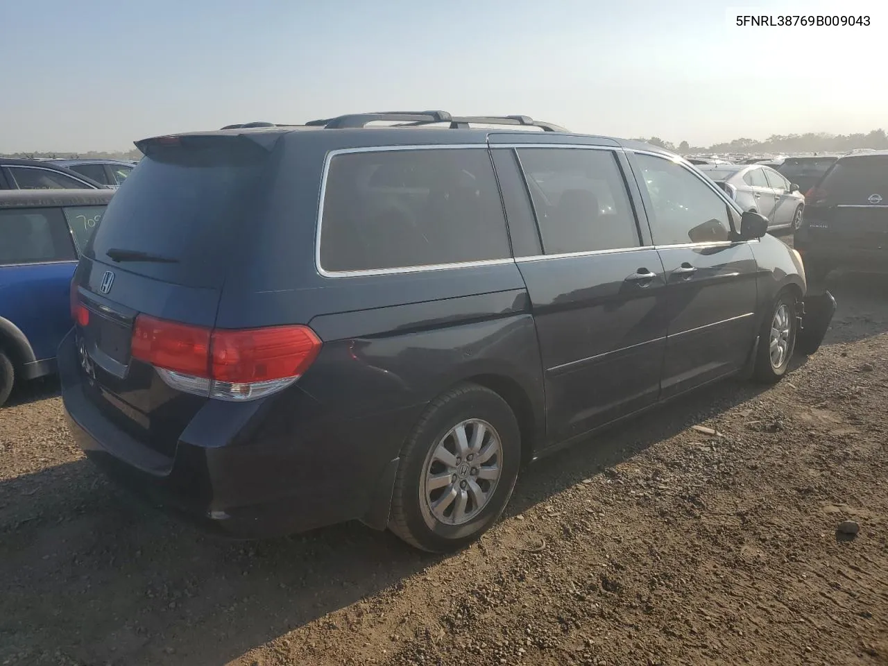 2009 Honda Odyssey Exl VIN: 5FNRL38769B009043 Lot: 71047444