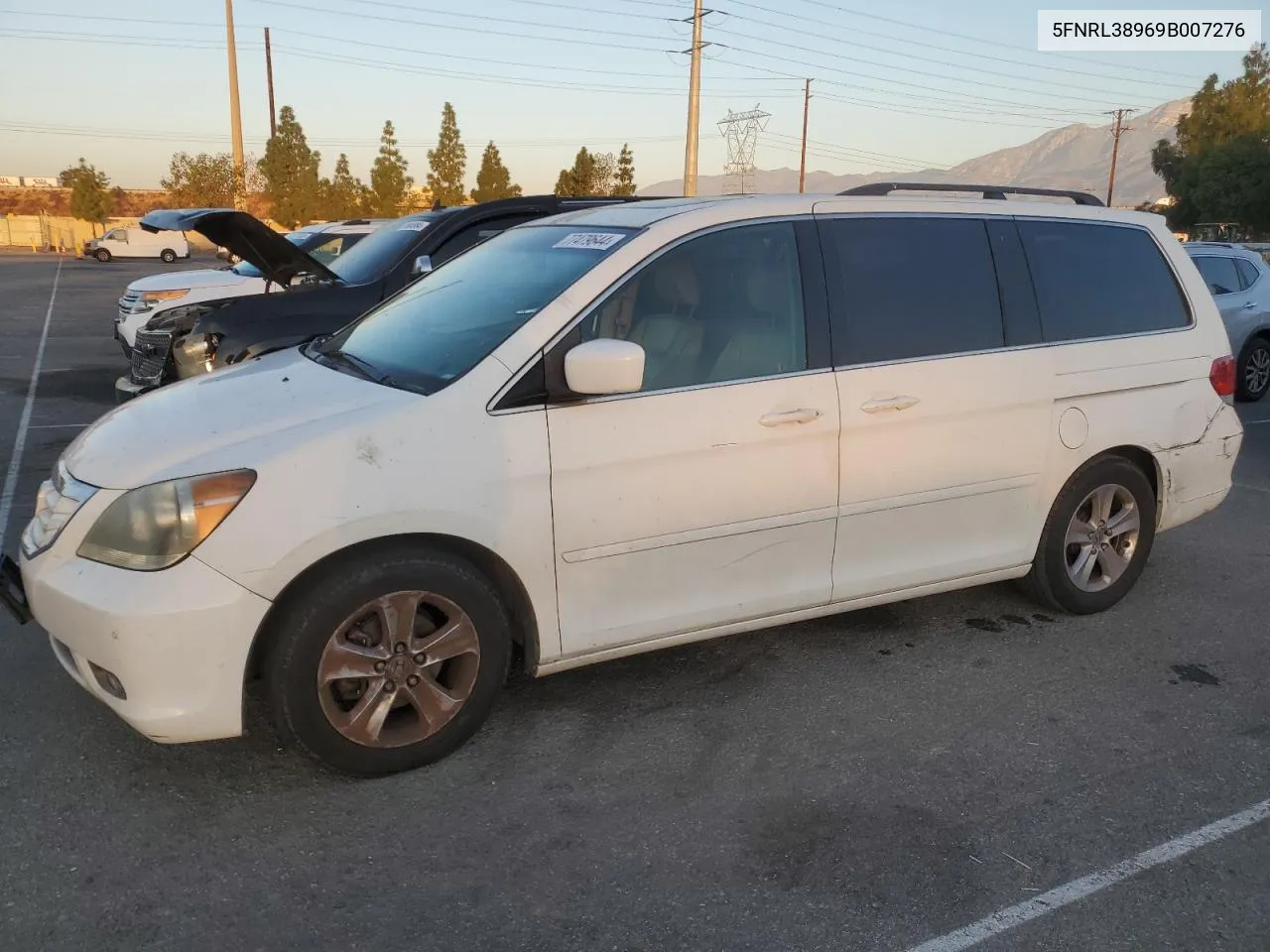 2009 Honda Odyssey Touring VIN: 5FNRL38969B007276 Lot: 77479644