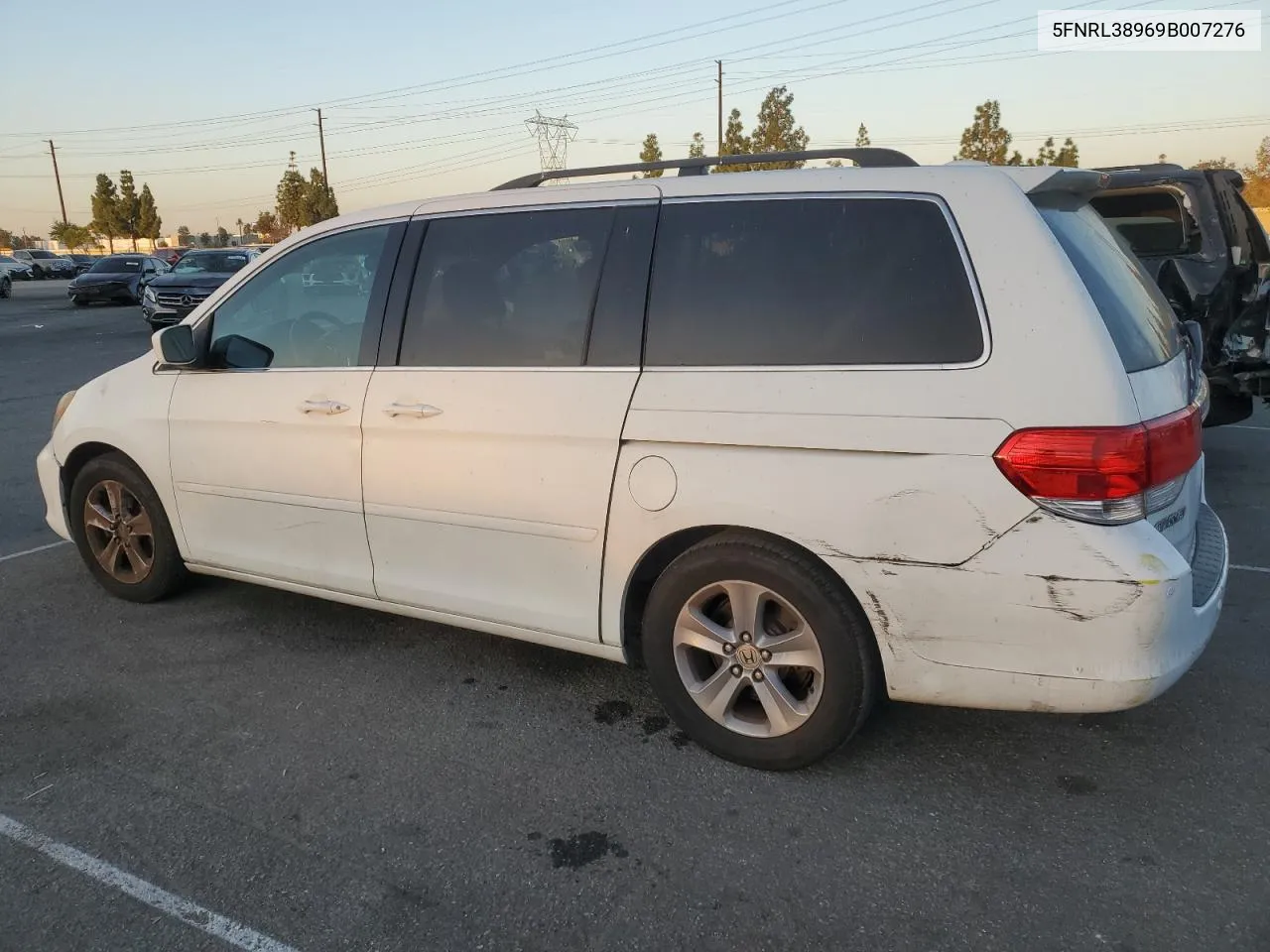 2009 Honda Odyssey Touring VIN: 5FNRL38969B007276 Lot: 77479644