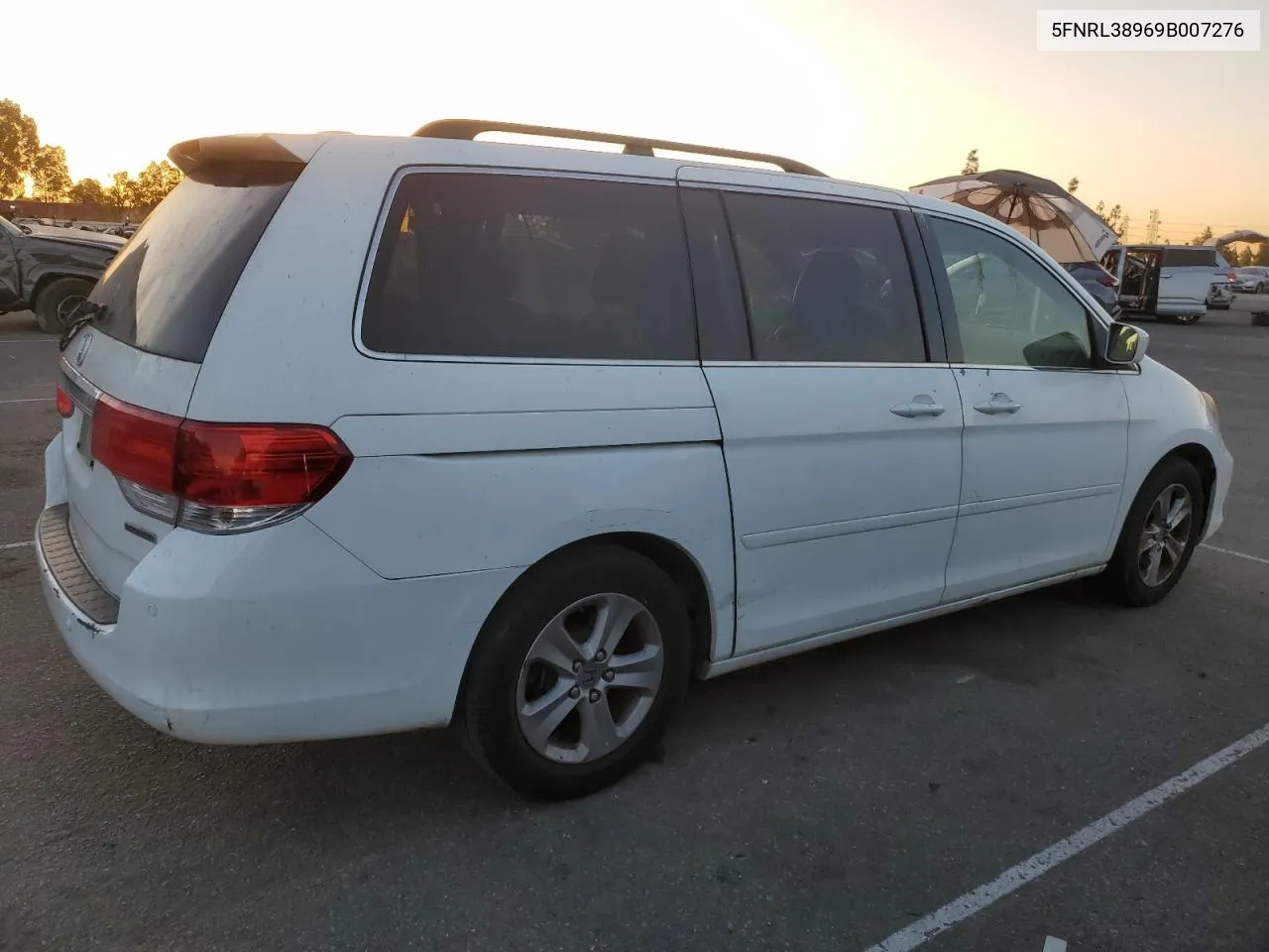 2009 Honda Odyssey Touring VIN: 5FNRL38969B007276 Lot: 77479644