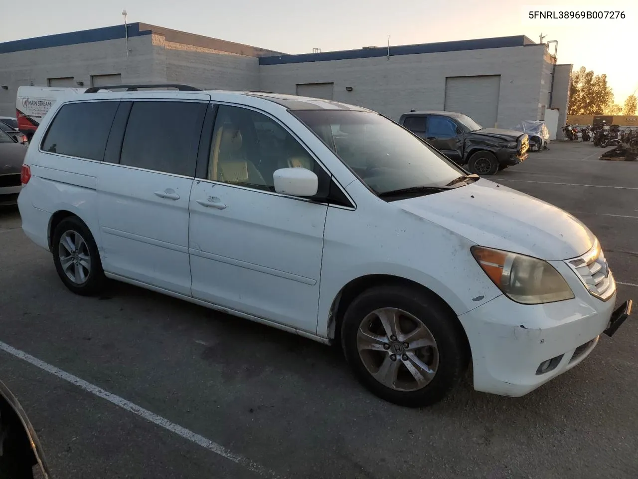 2009 Honda Odyssey Touring VIN: 5FNRL38969B007276 Lot: 77479644