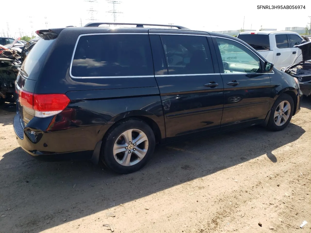 2010 Honda Odyssey Touring VIN: 5FNRL3H95AB056974 Lot: 55091054