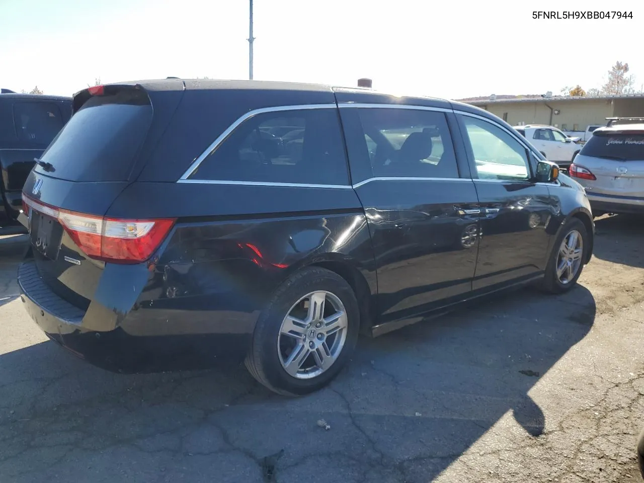 2011 Honda Odyssey Touring VIN: 5FNRL5H9XBB047944 Lot: 77302514