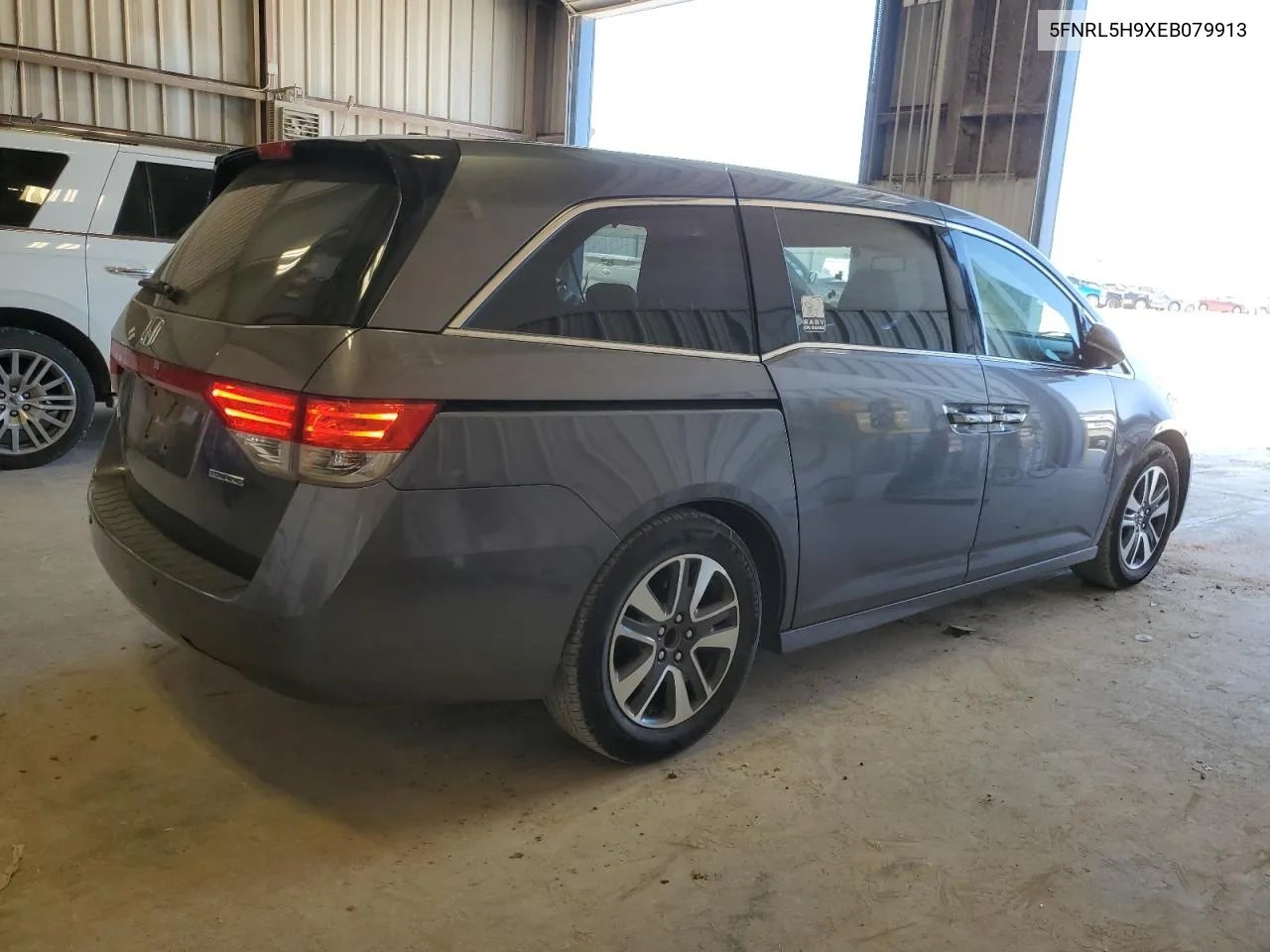 2014 Honda Odyssey Touring VIN: 5FNRL5H9XEB079913 Lot: 69050864