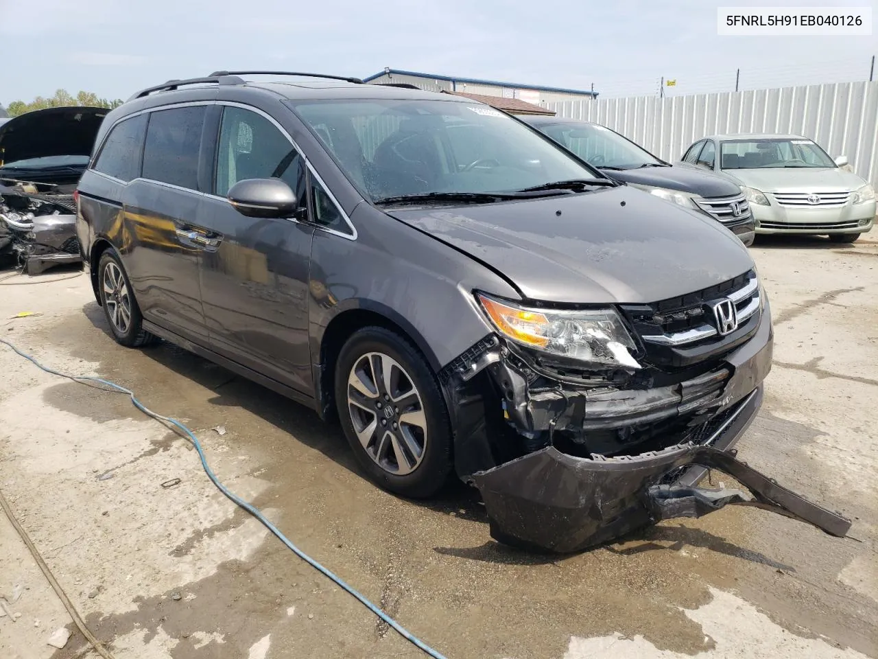 2014 Honda Odyssey Touring VIN: 5FNRL5H91EB040126 Lot: 69635054