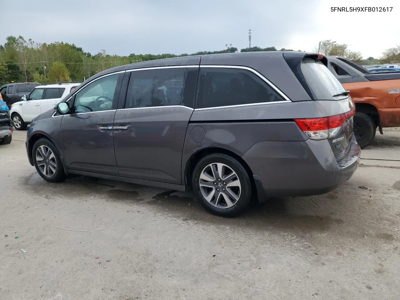 2015 Honda Odyssey Touring VIN: 5FNRL5H9XFB012617 Lot: 71354104