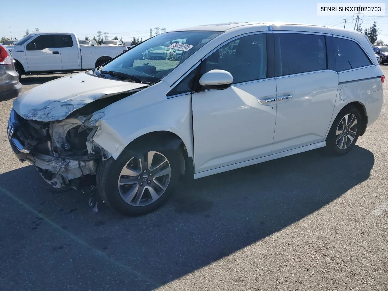 2015 Honda Odyssey Touring VIN: 5FNRL5H9XFB020703 Lot: 79869294