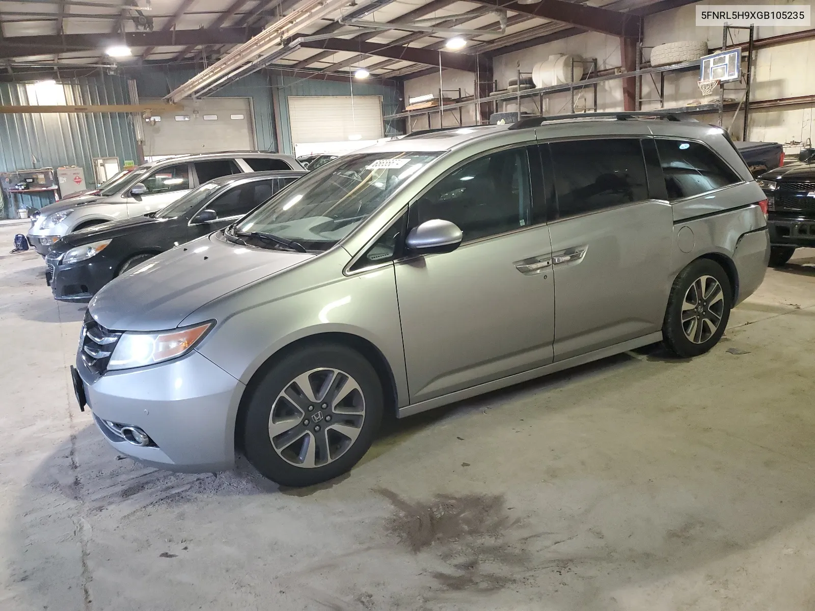 2016 Honda Odyssey Touring VIN: 5FNRL5H9XGB105235 Lot: 65656674