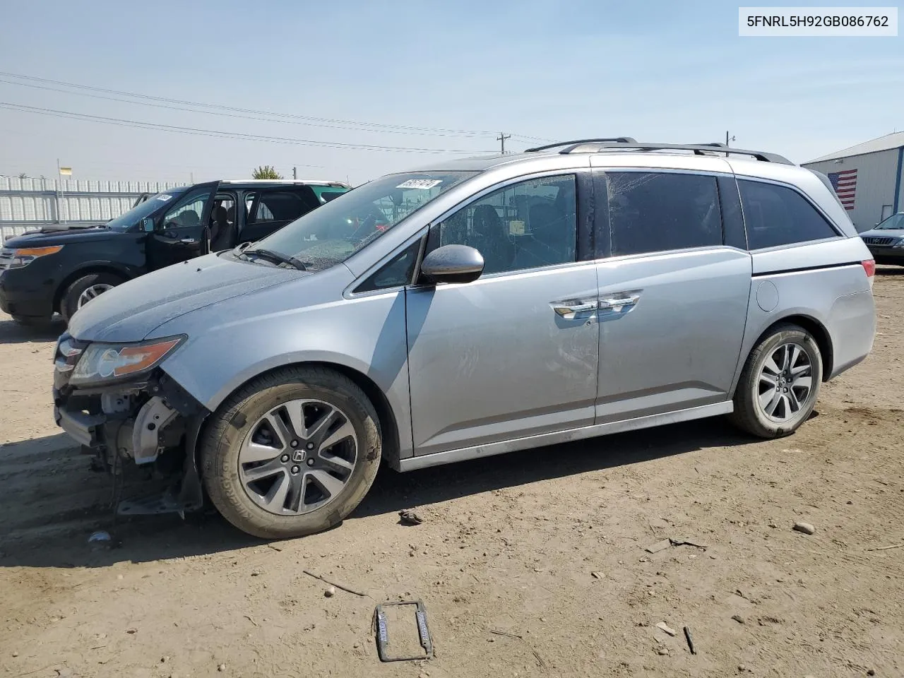 2016 Honda Odyssey Touring VIN: 5FNRL5H92GB086762 Lot: 69517474