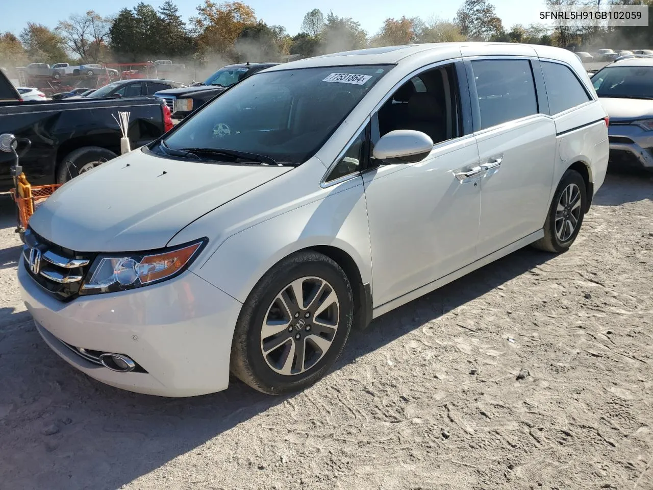 2016 Honda Odyssey Touring VIN: 5FNRL5H91GB102059 Lot: 77531864