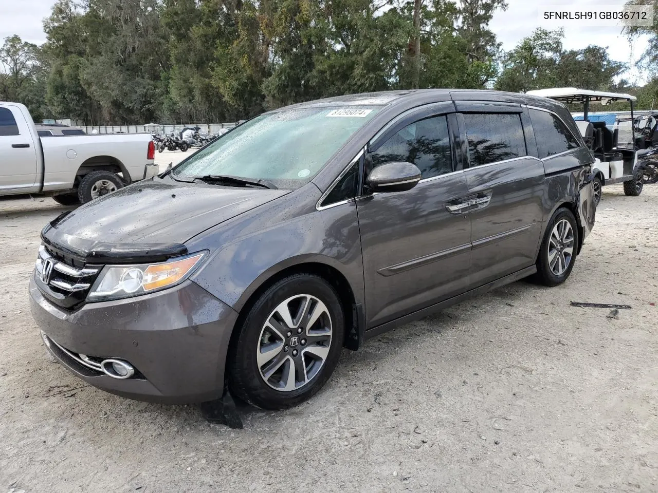 2016 Honda Odyssey Touring VIN: 5FNRL5H91GB036712 Lot: 81295074