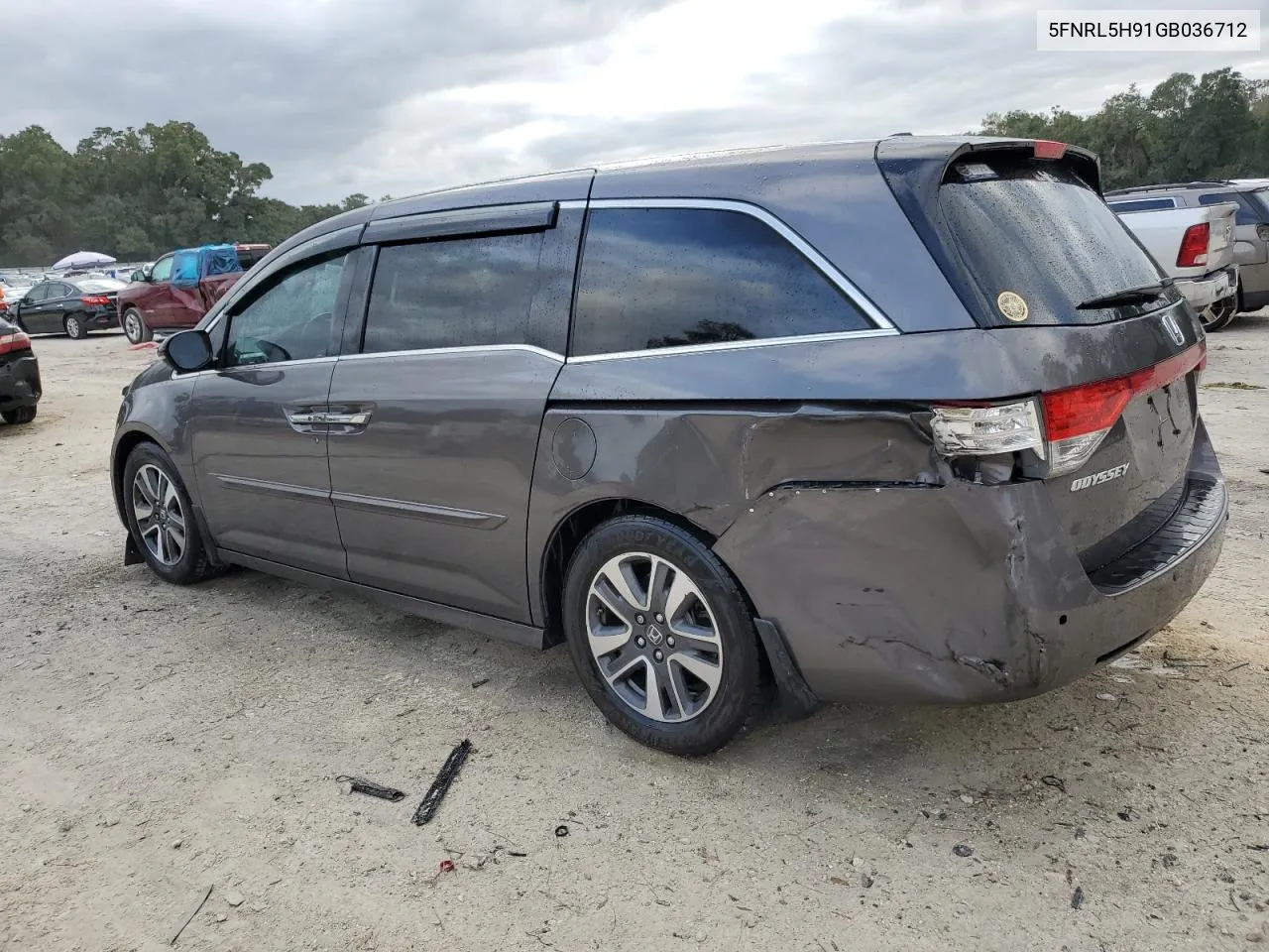 2016 Honda Odyssey Touring VIN: 5FNRL5H91GB036712 Lot: 81295074