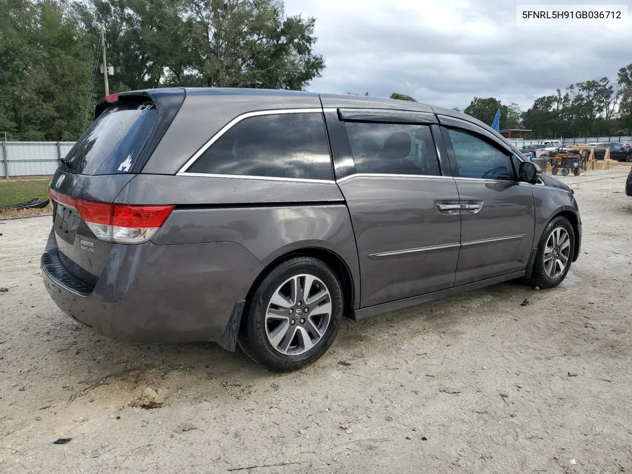 2016 Honda Odyssey Touring VIN: 5FNRL5H91GB036712 Lot: 81295074