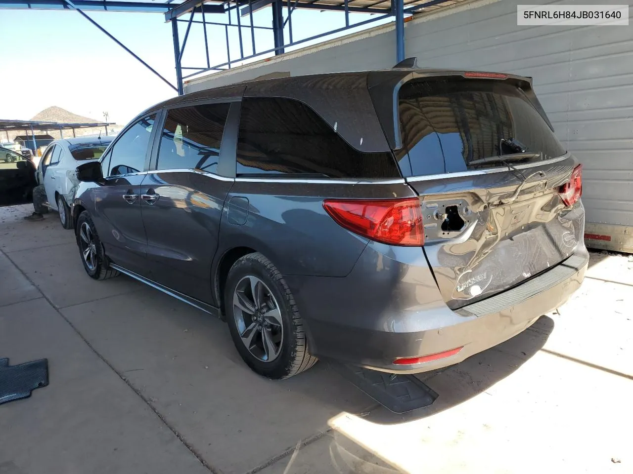 2018 Honda Odyssey Touring VIN: 5FNRL6H84JB031640 Lot: 69304324