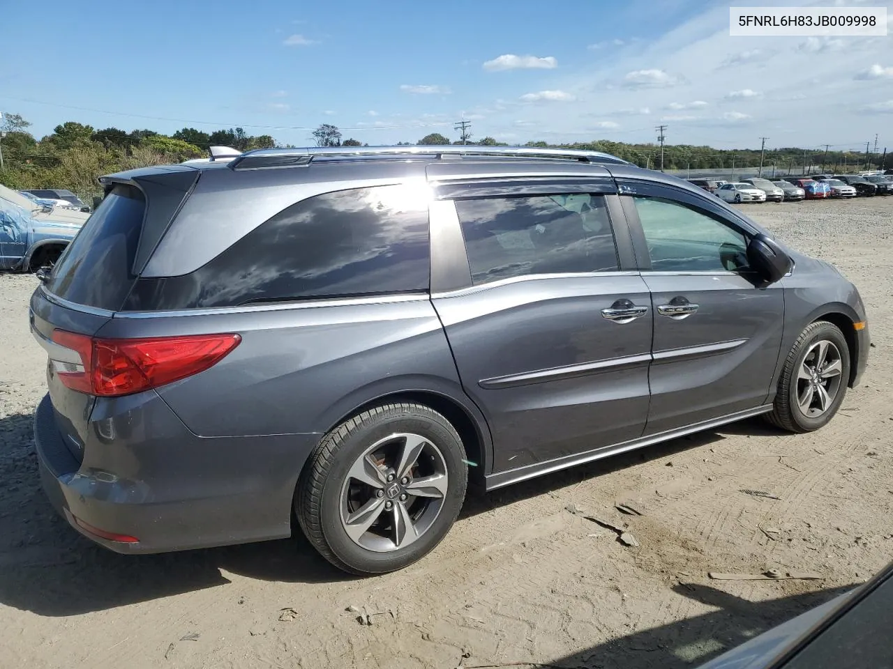 2018 Honda Odyssey Touring VIN: 5FNRL6H83JB009998 Lot: 76081514