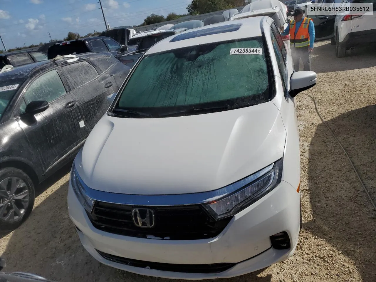 2024 Honda Odyssey Touring VIN: 5FNRL6H83RB035612 Lot: 74208344