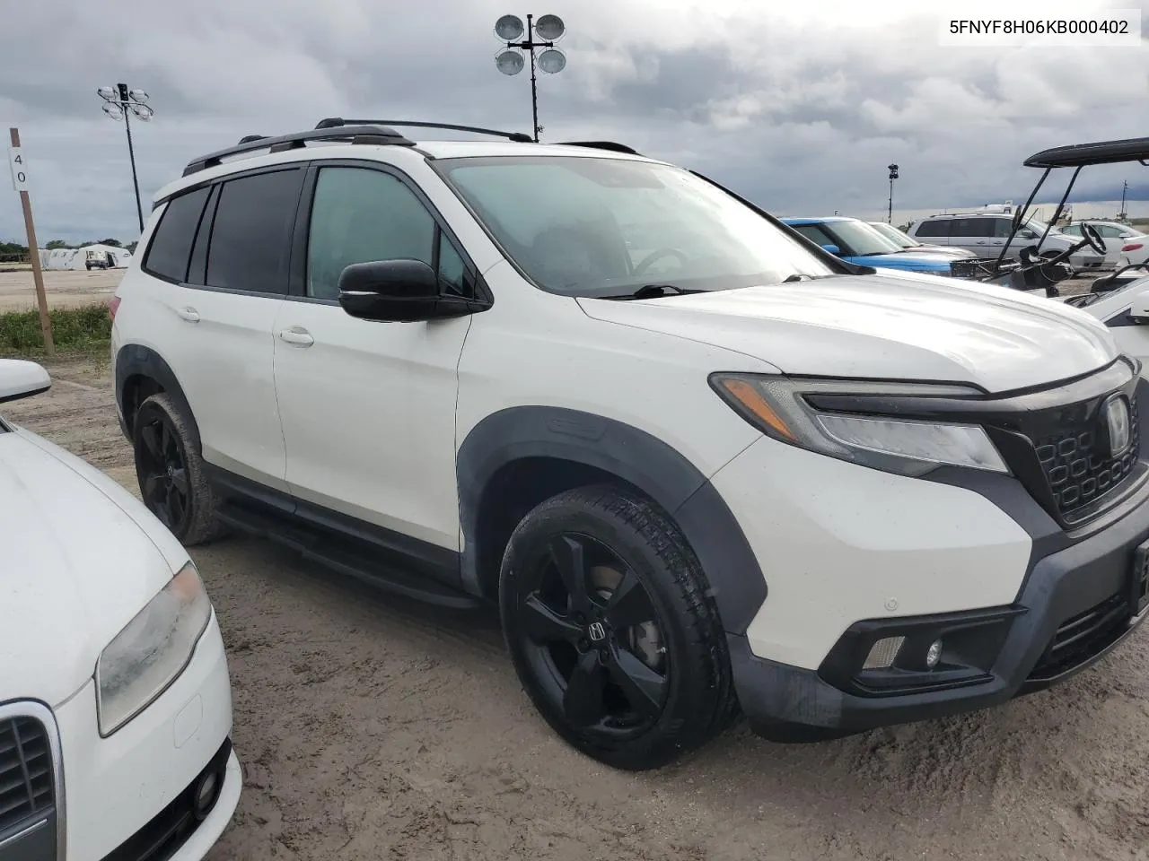 2019 Honda Passport Elite VIN: 5FNYF8H06KB000402 Lot: 74619844