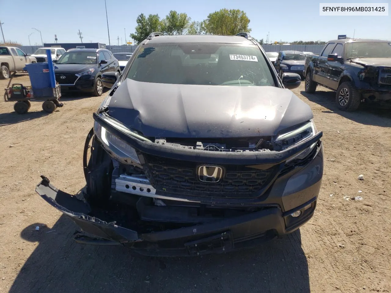 2021 Honda Passport Touring VIN: 5FNYF8H96MB031425 Lot: 73463774