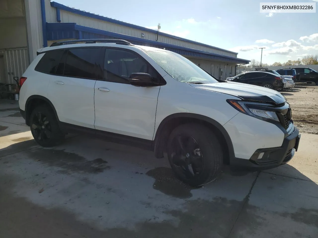 2021 Honda Passport Elite VIN: 5FNYF8H0XMB032286 Lot: 77494094