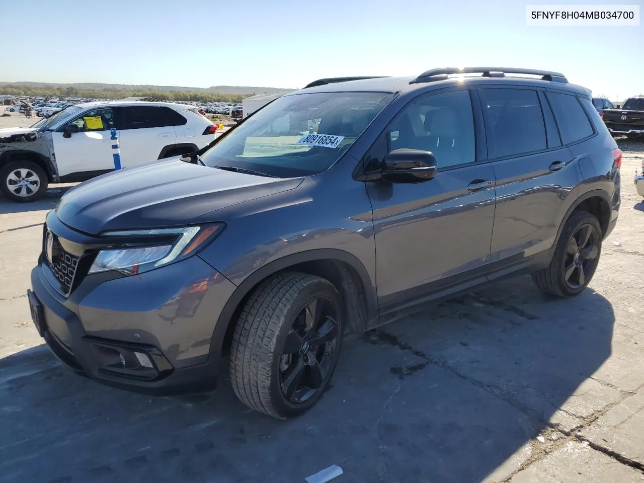 2021 Honda Passport Elite VIN: 5FNYF8H04MB034700 Lot: 80916854