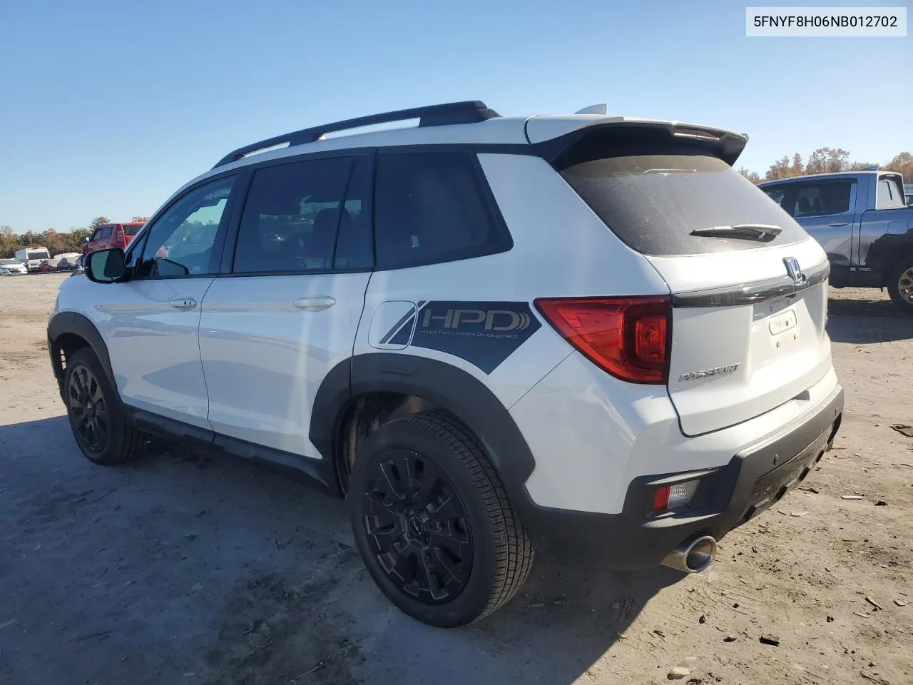 2022 Honda Passport Elite VIN: 5FNYF8H06NB012702 Lot: 76440494