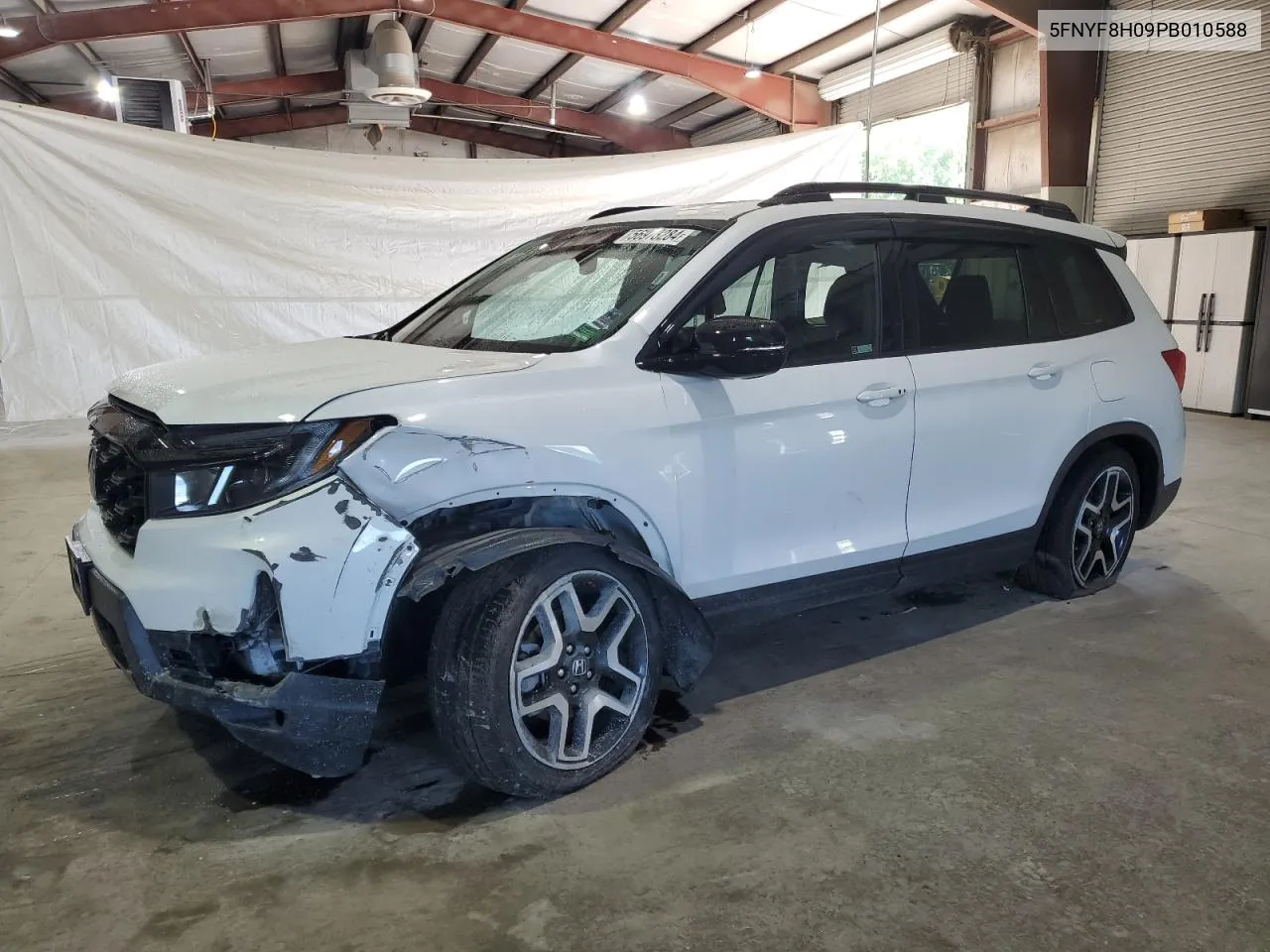 2023 Honda Passport Elite VIN: 5FNYF8H09PB010588 Lot: 56973284