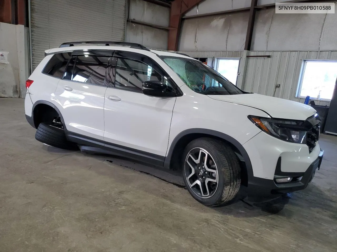 2023 Honda Passport Elite VIN: 5FNYF8H09PB010588 Lot: 56973284