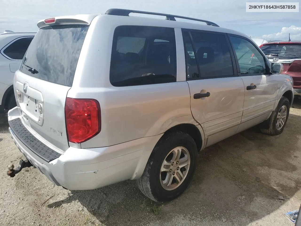 2003 Honda Pilot Exl VIN: 2HKYF18643H587858 Lot: 74885484