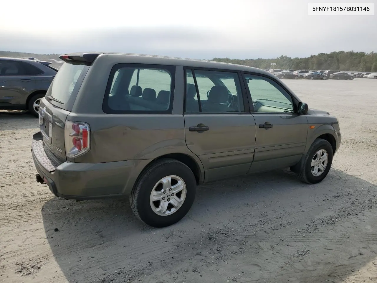 2007 Honda Pilot Lx VIN: 5FNYF18157B031146 Lot: 71250264