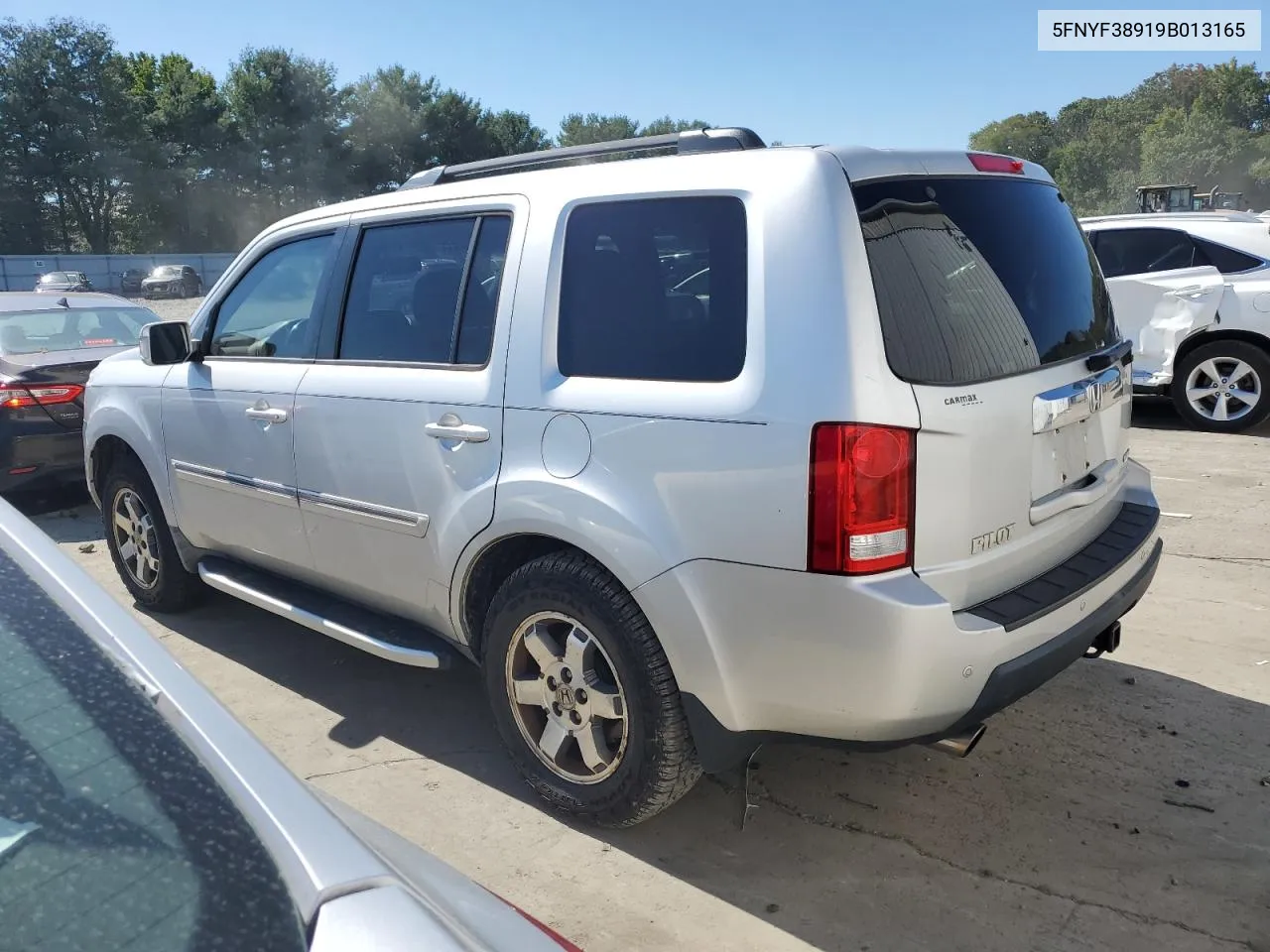 2009 Honda Pilot Touring VIN: 5FNYF38919B013165 Lot: 71083254