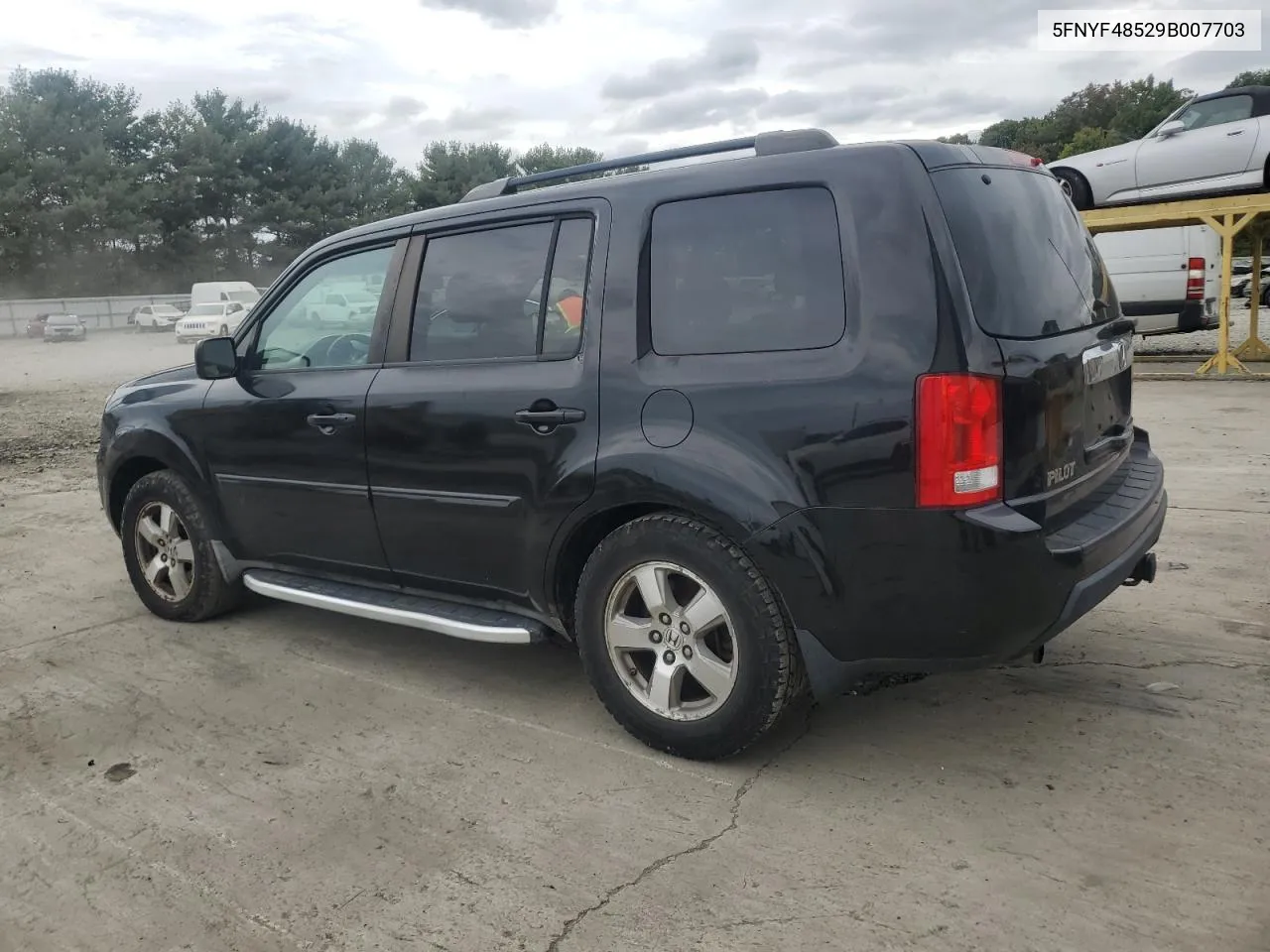 2009 Honda Pilot Exl VIN: 5FNYF48529B007703 Lot: 72314494