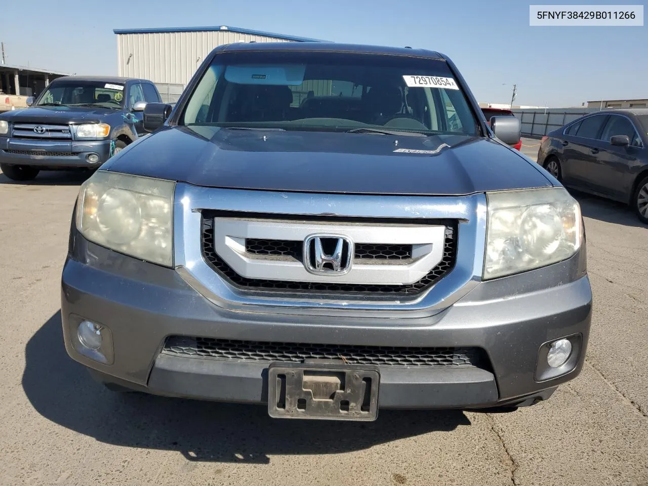 2009 Honda Pilot Ex VIN: 5FNYF38429B011266 Lot: 72970854